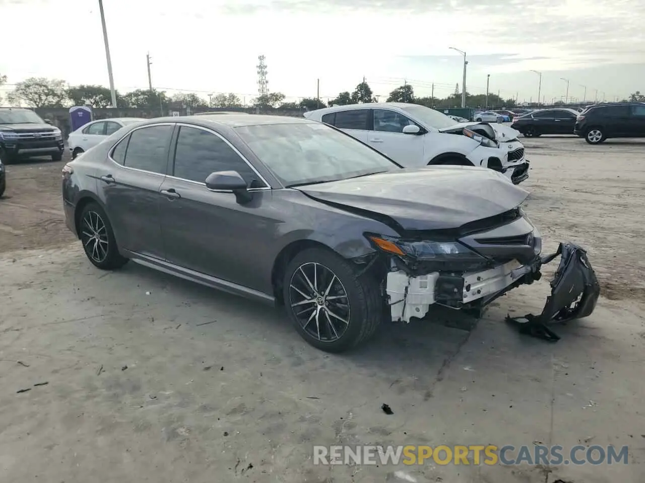 4 Photograph of a damaged car 4T1G11AK4PU732969 TOYOTA CAMRY 2023