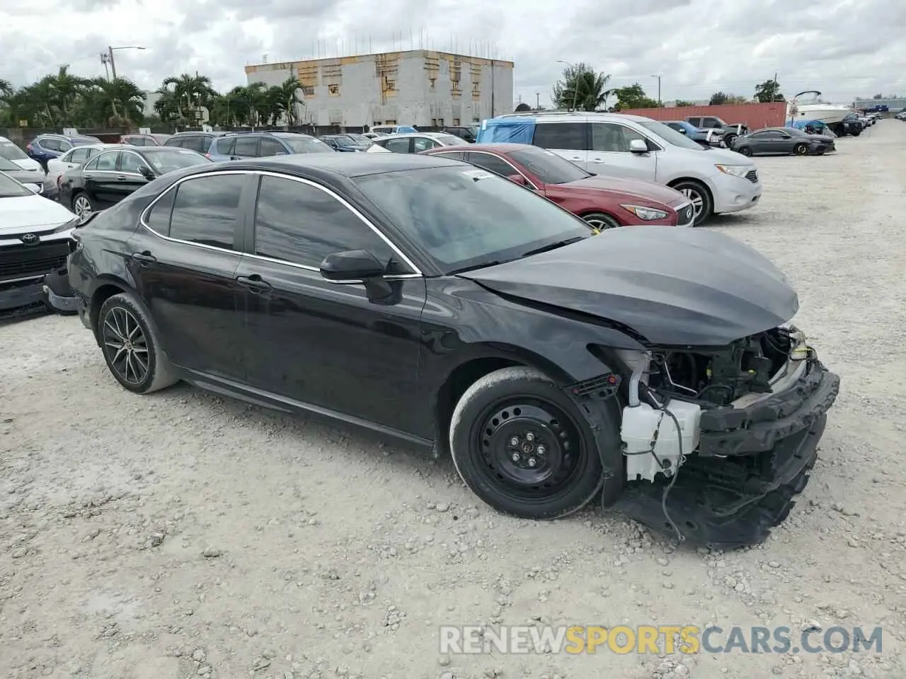 4 Photograph of a damaged car 4T1G11AK4PU764921 TOYOTA CAMRY 2023