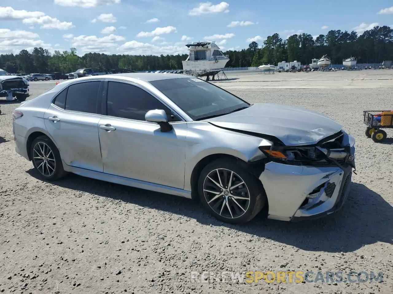 4 Photograph of a damaged car 4T1G11AK4PU766183 TOYOTA CAMRY 2023