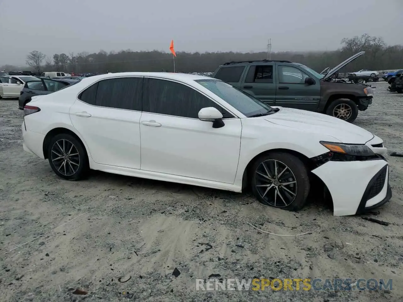 4 Photograph of a damaged car 4T1G11AK5PU728476 TOYOTA CAMRY 2023