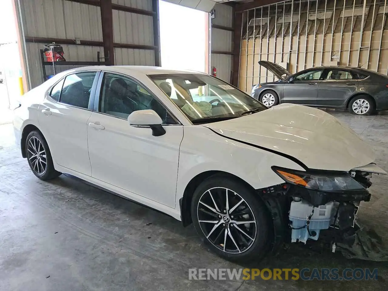 4 Photograph of a damaged car 4T1G11AK5PU814371 TOYOTA CAMRY 2023