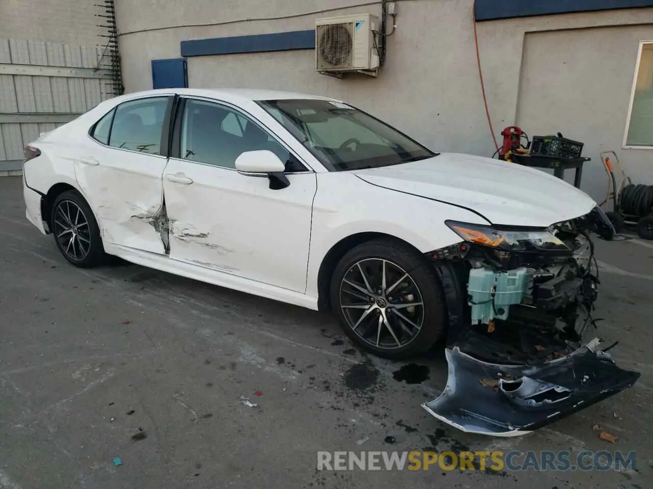4 Photograph of a damaged car 4T1G11AK6PU123060 TOYOTA CAMRY 2023