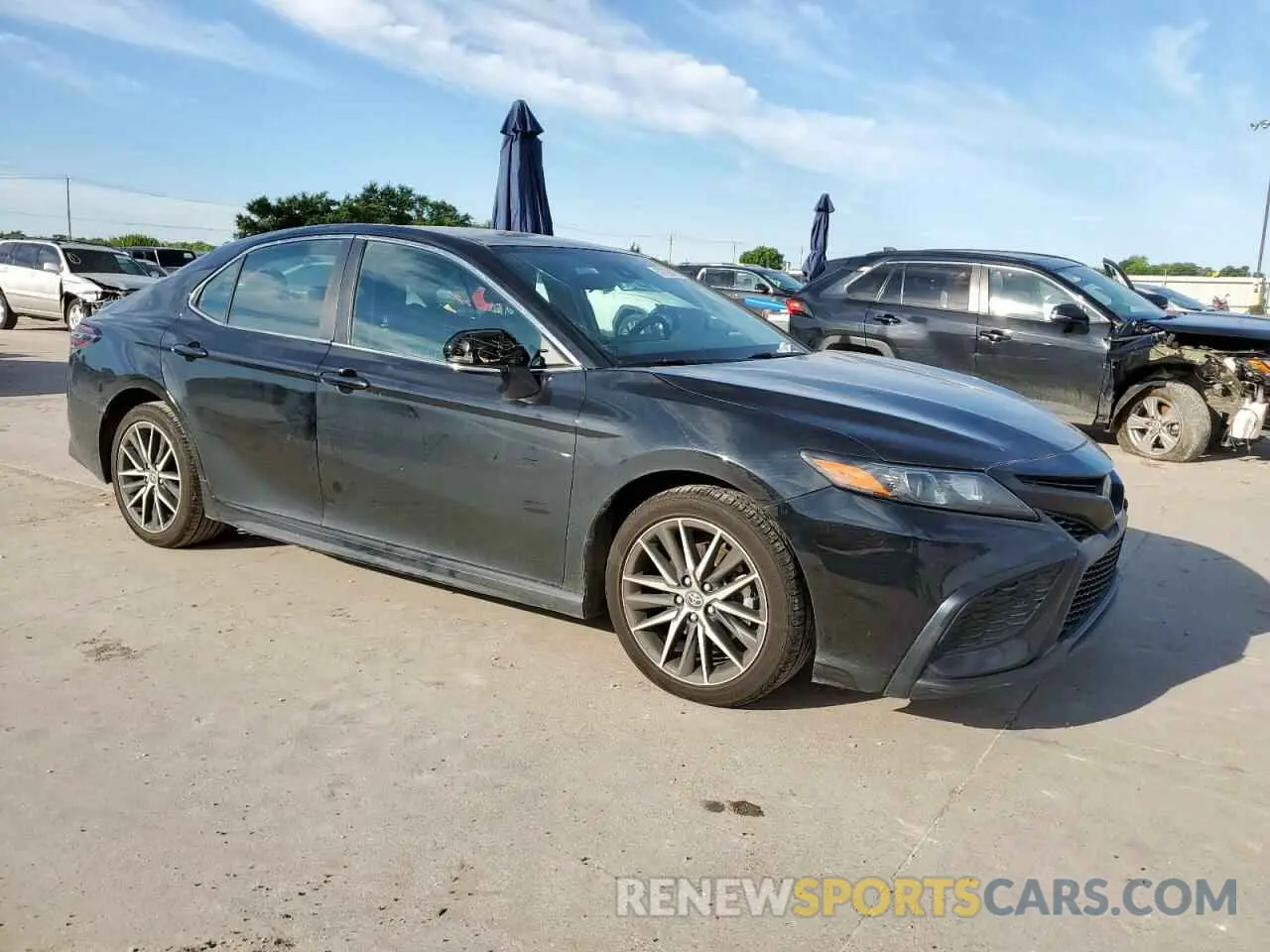 4 Photograph of a damaged car 4T1G11AK6PU767013 TOYOTA CAMRY 2023