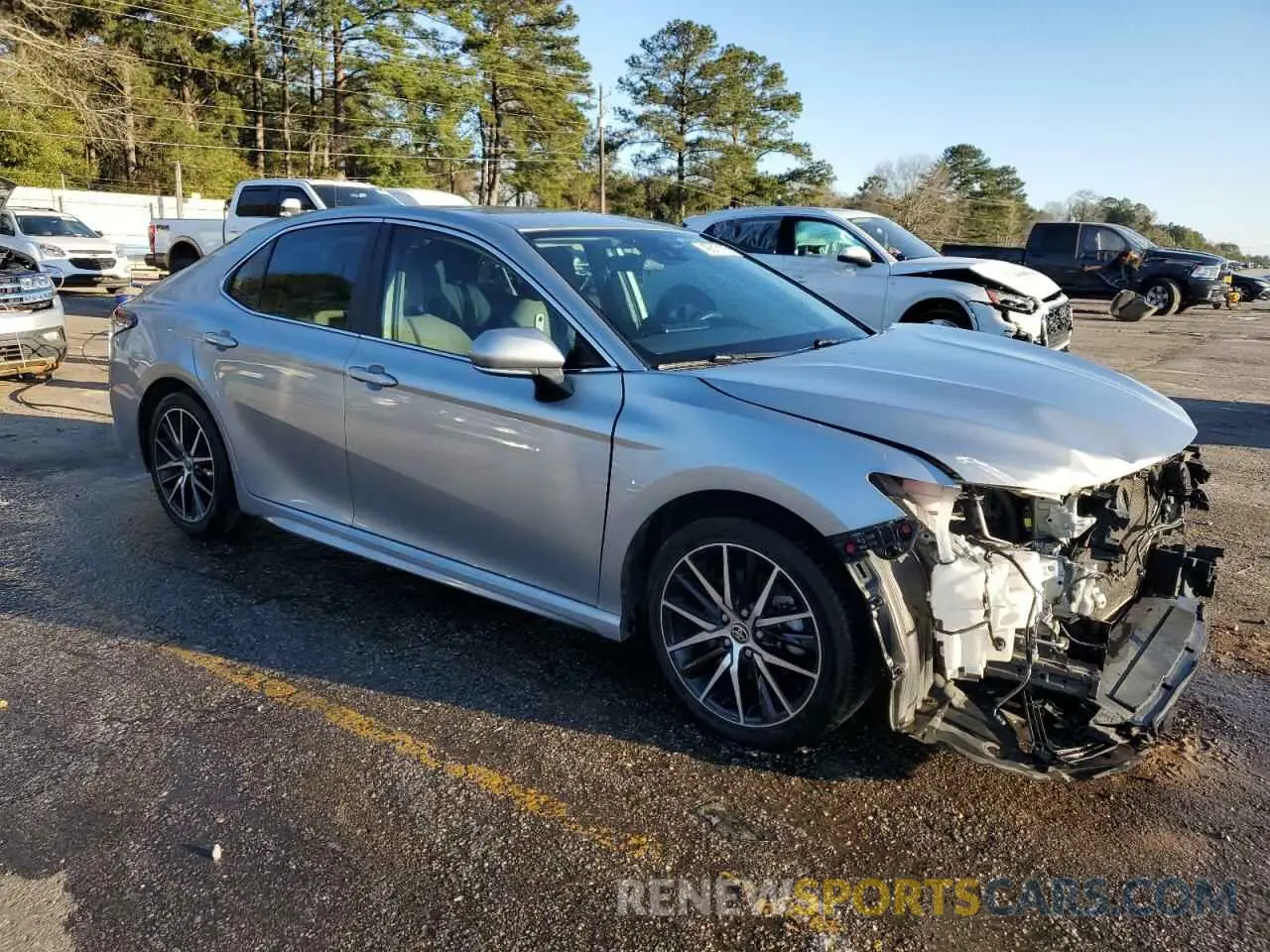 4 Photograph of a damaged car 4T1G11AKXPU098194 TOYOTA CAMRY 2023