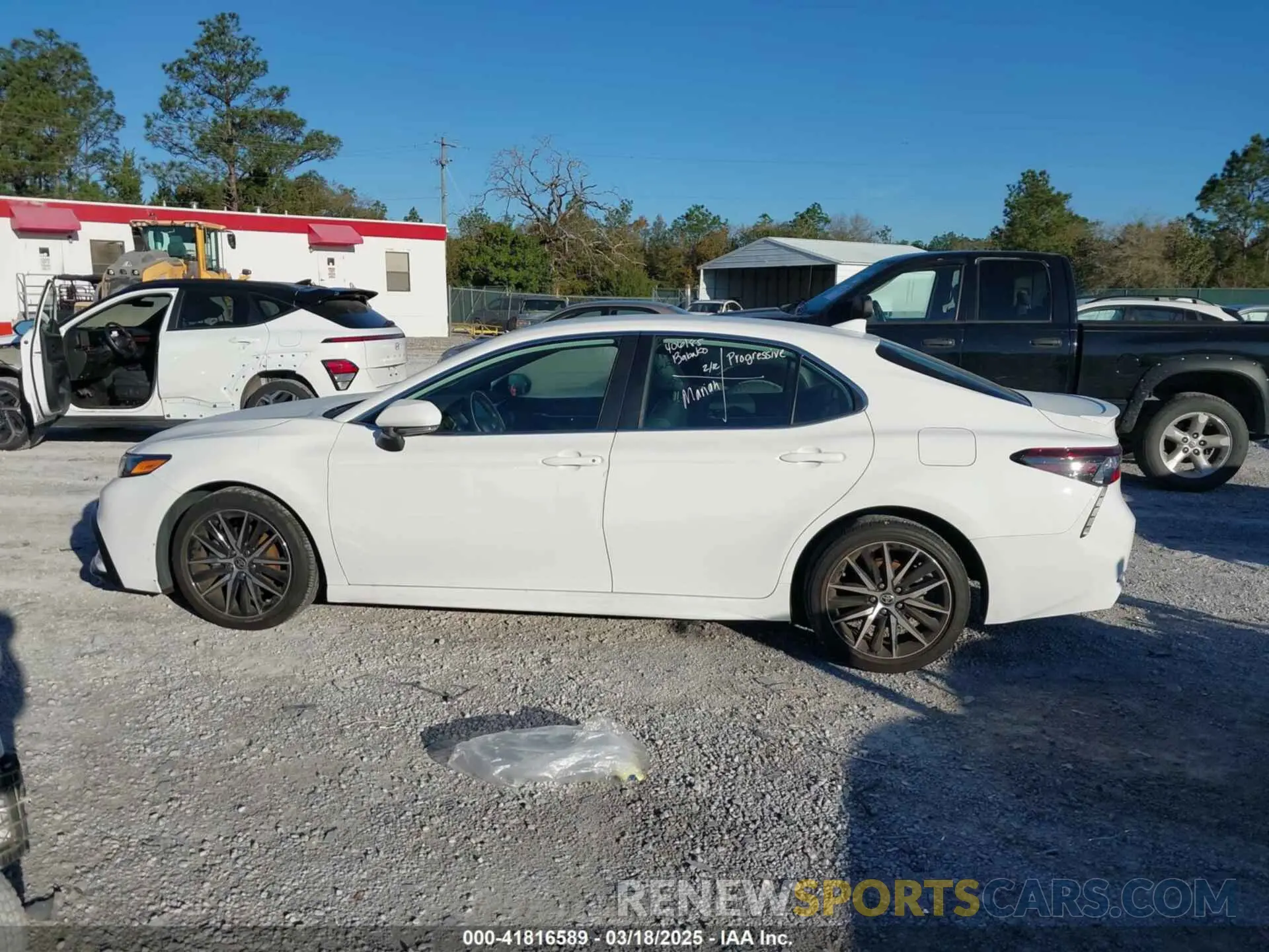 14 Photograph of a damaged car 4T1G11AKXPU153288 TOYOTA CAMRY 2023