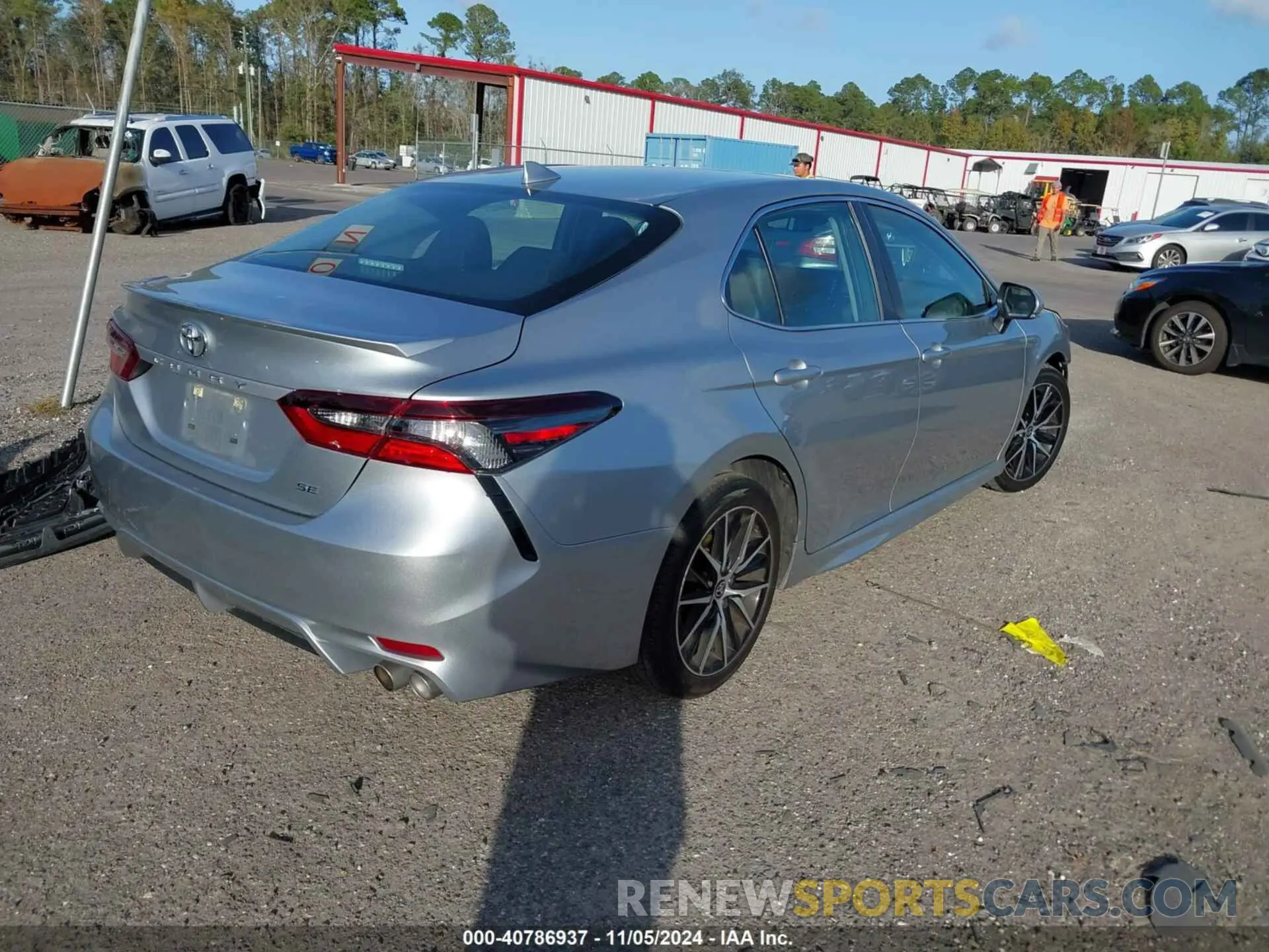 4 Photograph of a damaged car 4T1G11AKXPU736895 TOYOTA CAMRY 2023