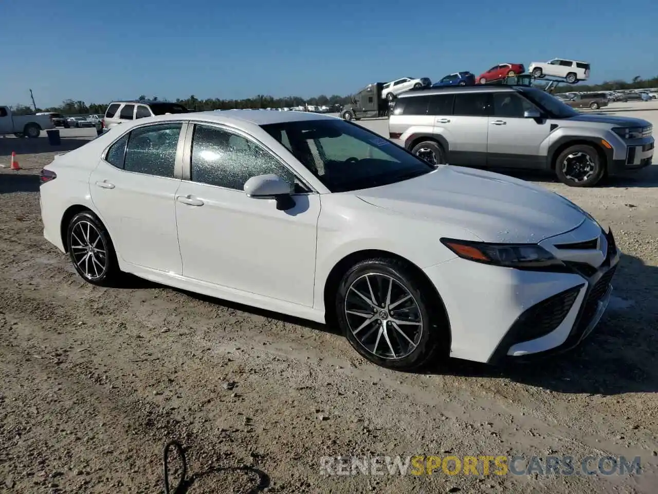 4 Photograph of a damaged car 4T1G11AKXPU737478 TOYOTA CAMRY 2023