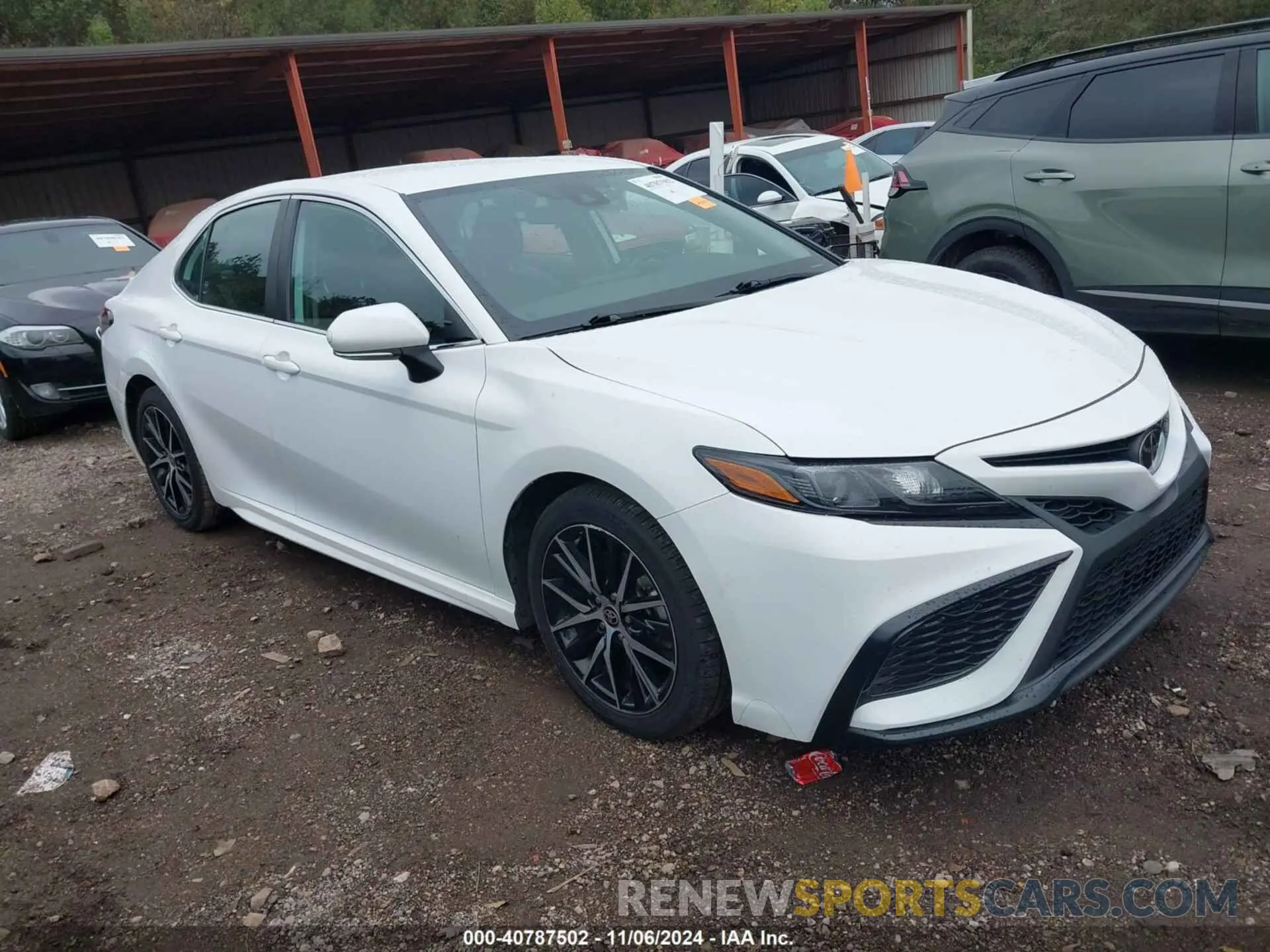 1 Photograph of a damaged car 4T1G11AKXPU738923 TOYOTA CAMRY 2023