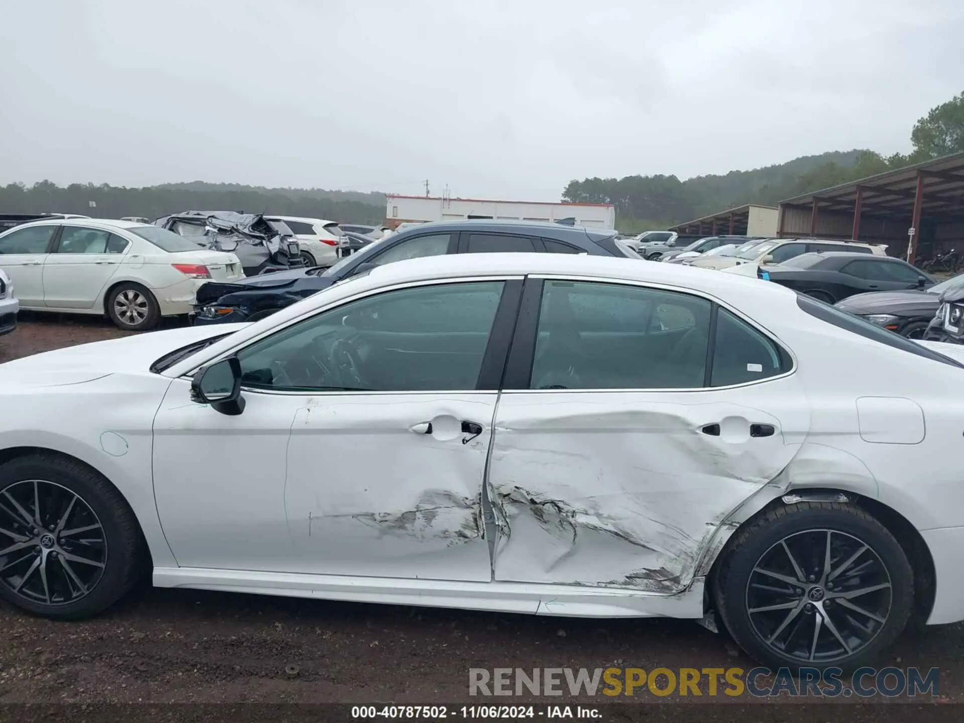 14 Photograph of a damaged car 4T1G11AKXPU738923 TOYOTA CAMRY 2023