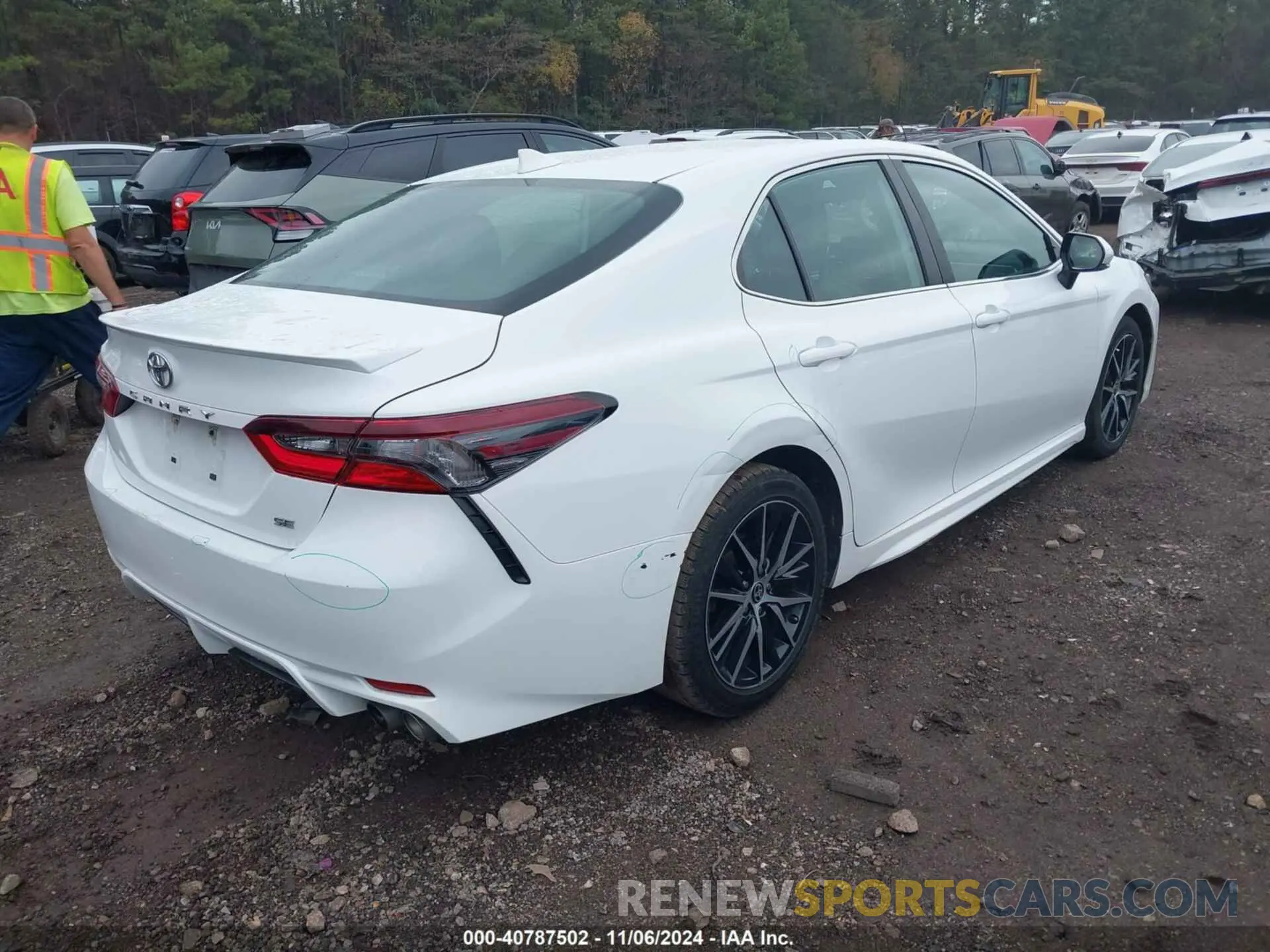 4 Photograph of a damaged car 4T1G11AKXPU738923 TOYOTA CAMRY 2023