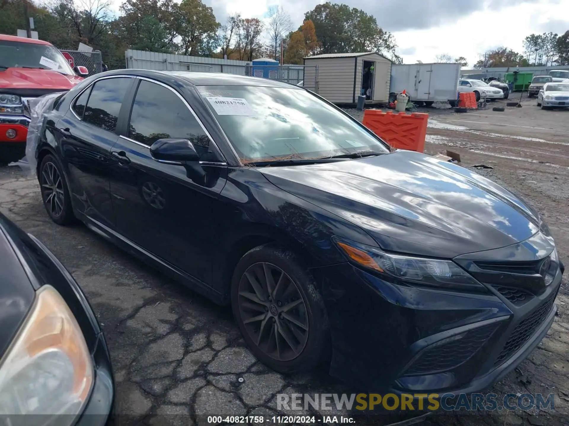 1 Photograph of a damaged car 4T1G11AKXPU748688 TOYOTA CAMRY 2023