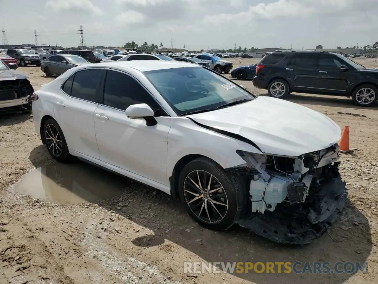 4 Photograph of a damaged car 4T1G11AKXPU767953 TOYOTA CAMRY 2023