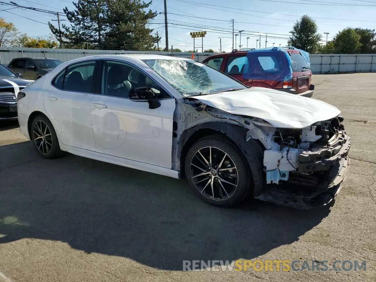 4 Photograph of a damaged car 4T1G11AKXPU769637 TOYOTA CAMRY 2023