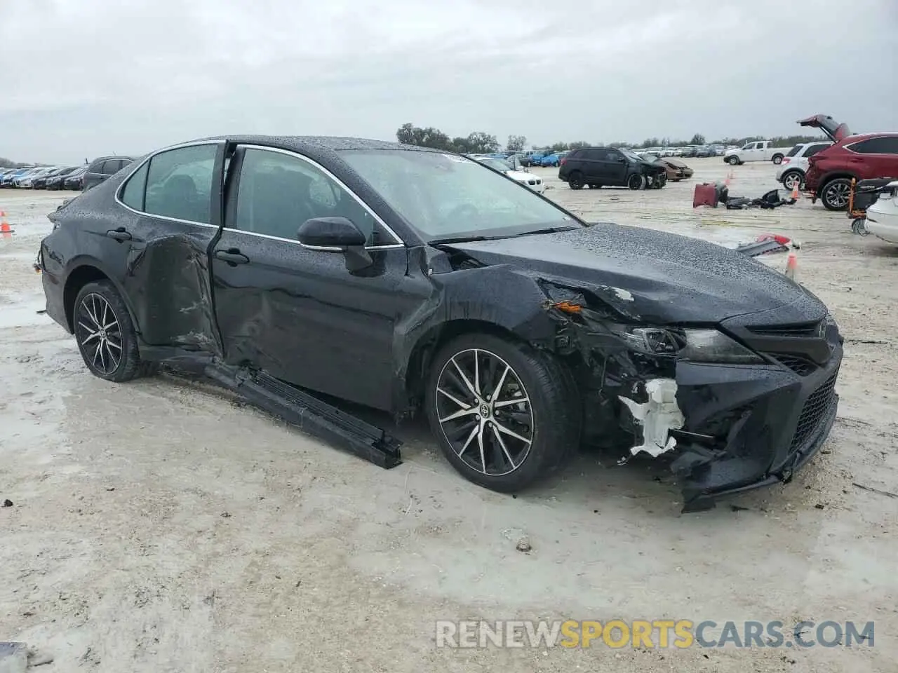 4 Photograph of a damaged car 4T1G11AKXPU787748 TOYOTA CAMRY 2023