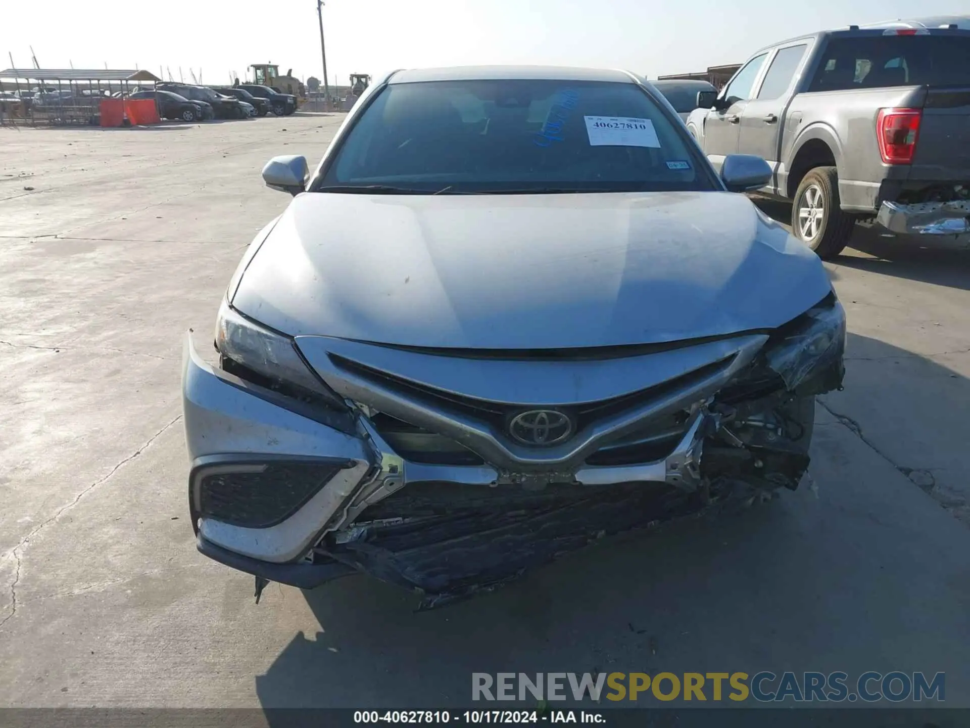 12 Photograph of a damaged car 4T1G11AKXPU799673 TOYOTA CAMRY 2023