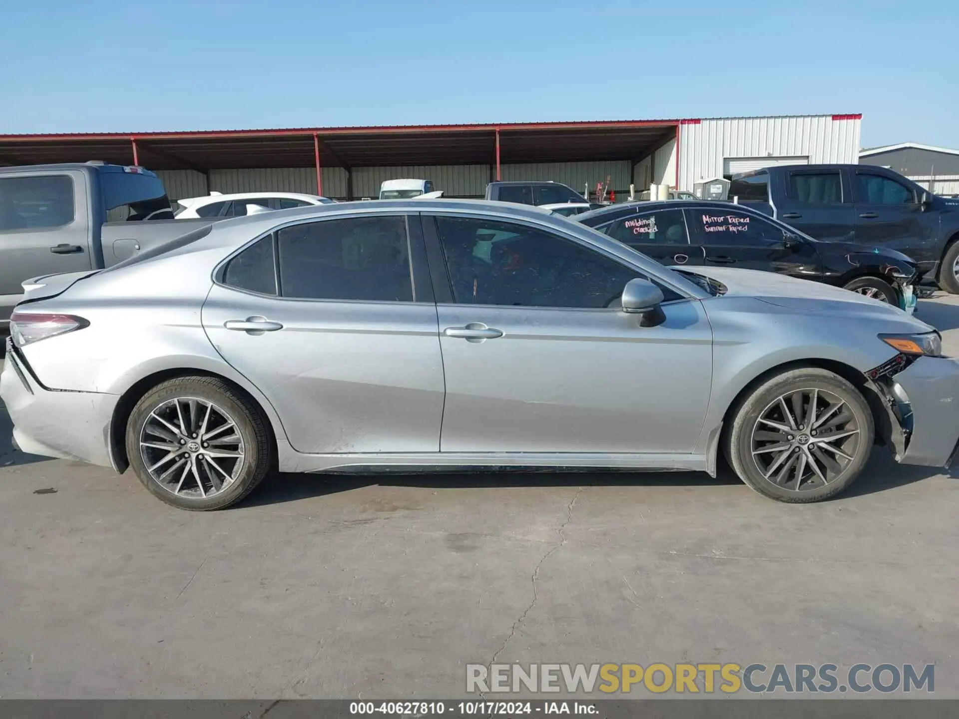 13 Photograph of a damaged car 4T1G11AKXPU799673 TOYOTA CAMRY 2023
