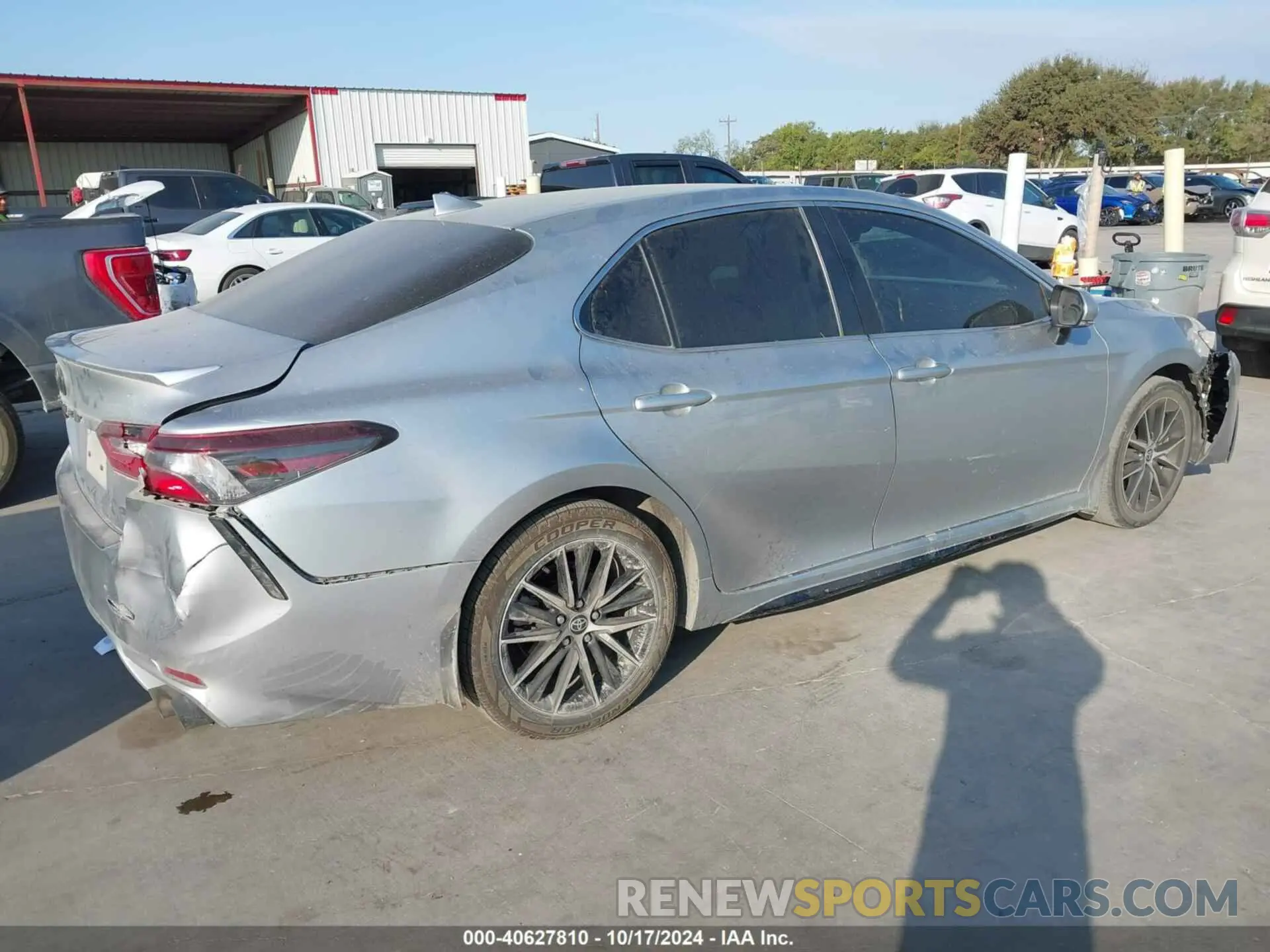 4 Photograph of a damaged car 4T1G11AKXPU799673 TOYOTA CAMRY 2023