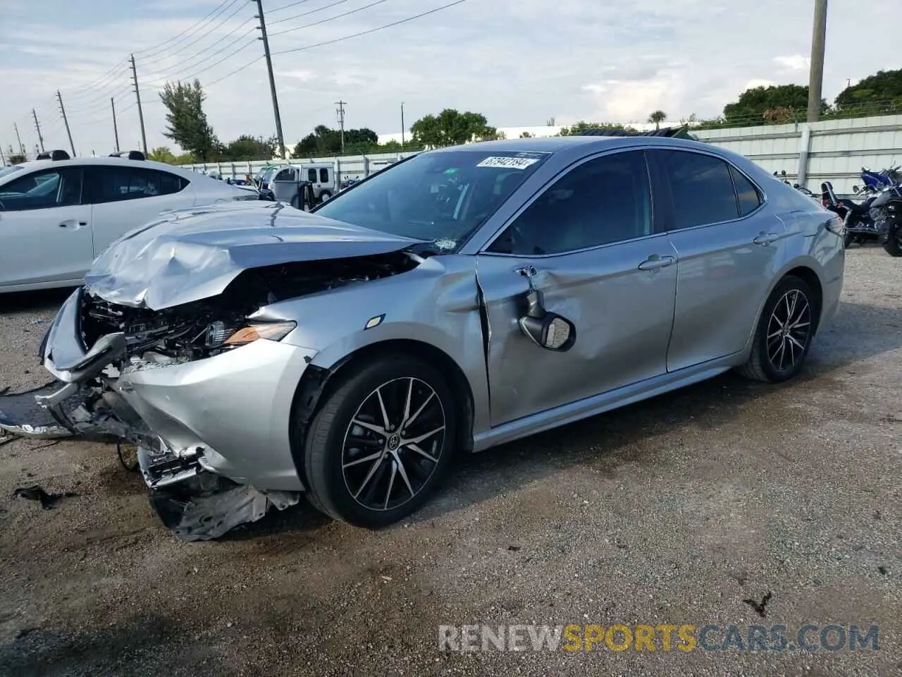 1 Photograph of a damaged car 4T1G11AKXPU828721 TOYOTA CAMRY 2023