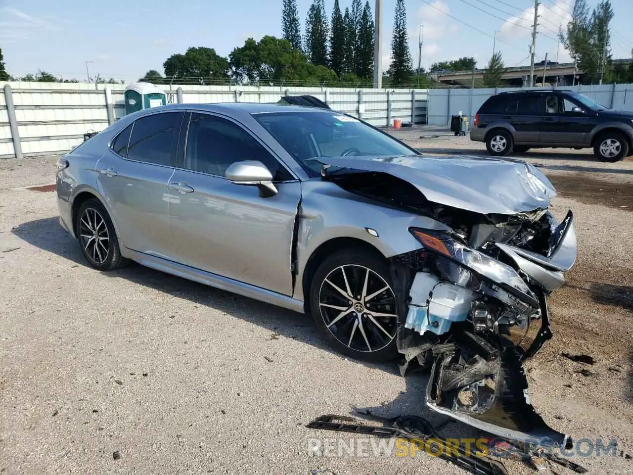 4 Photograph of a damaged car 4T1G11AKXPU828721 TOYOTA CAMRY 2023