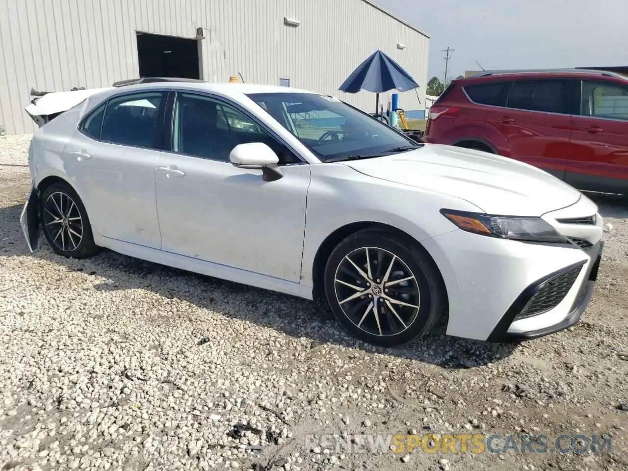 4 Photograph of a damaged car 4T1G11AKXPU837029 TOYOTA CAMRY 2023