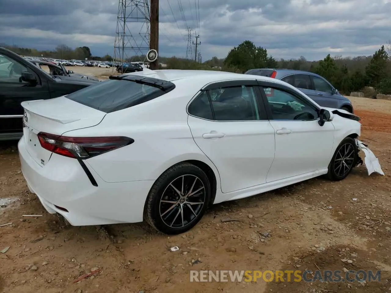 3 Photograph of a damaged car 4T1G11BK0PU084075 TOYOTA CAMRY 2023