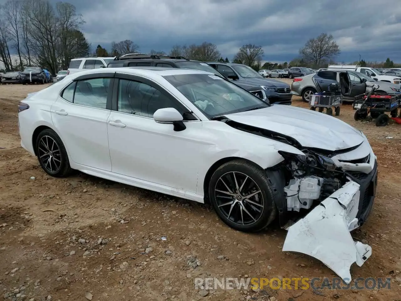 4 Photograph of a damaged car 4T1G11BK0PU084075 TOYOTA CAMRY 2023