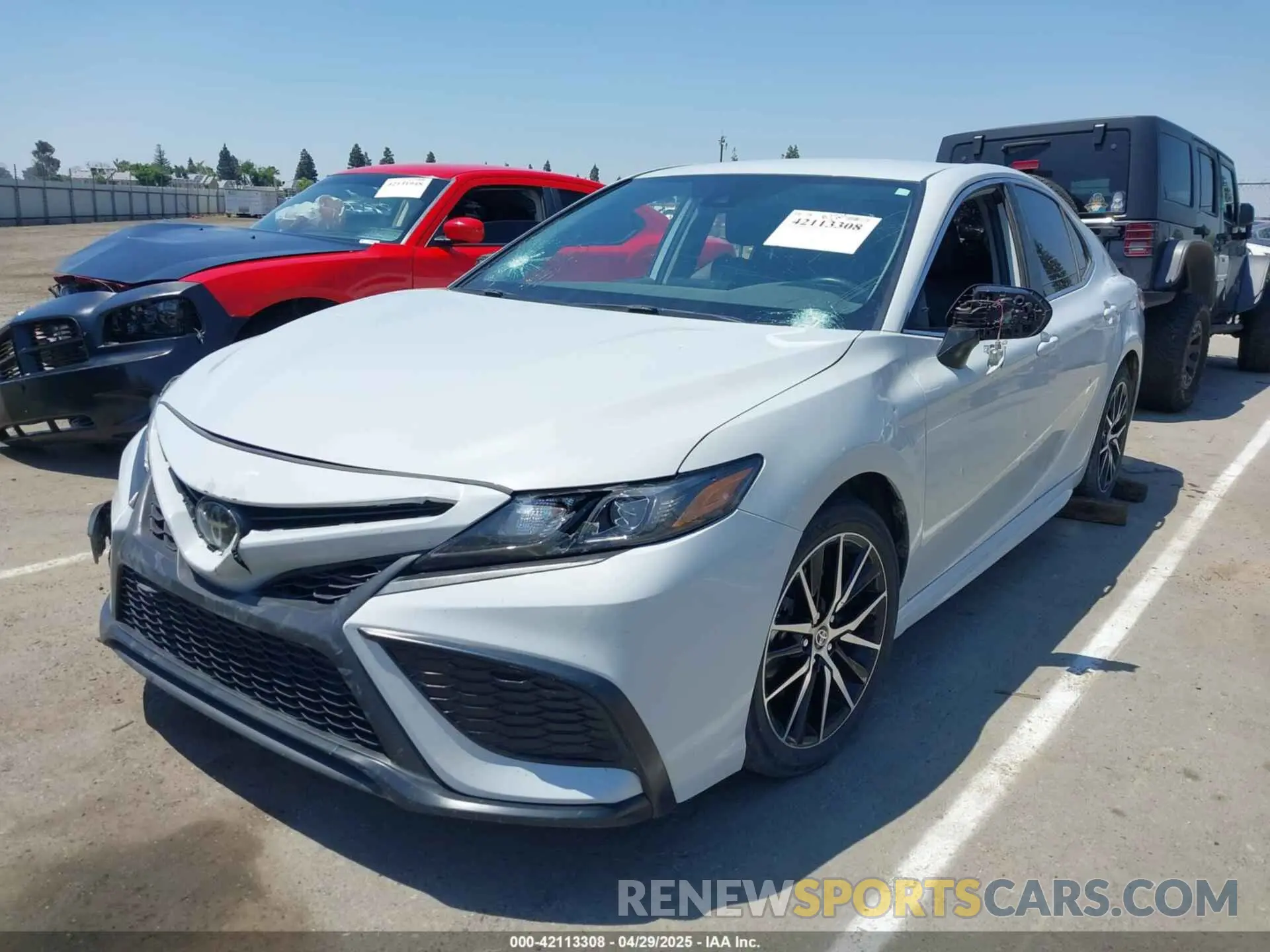 2 Photograph of a damaged car 4T1G11BK0PU099904 TOYOTA CAMRY 2023