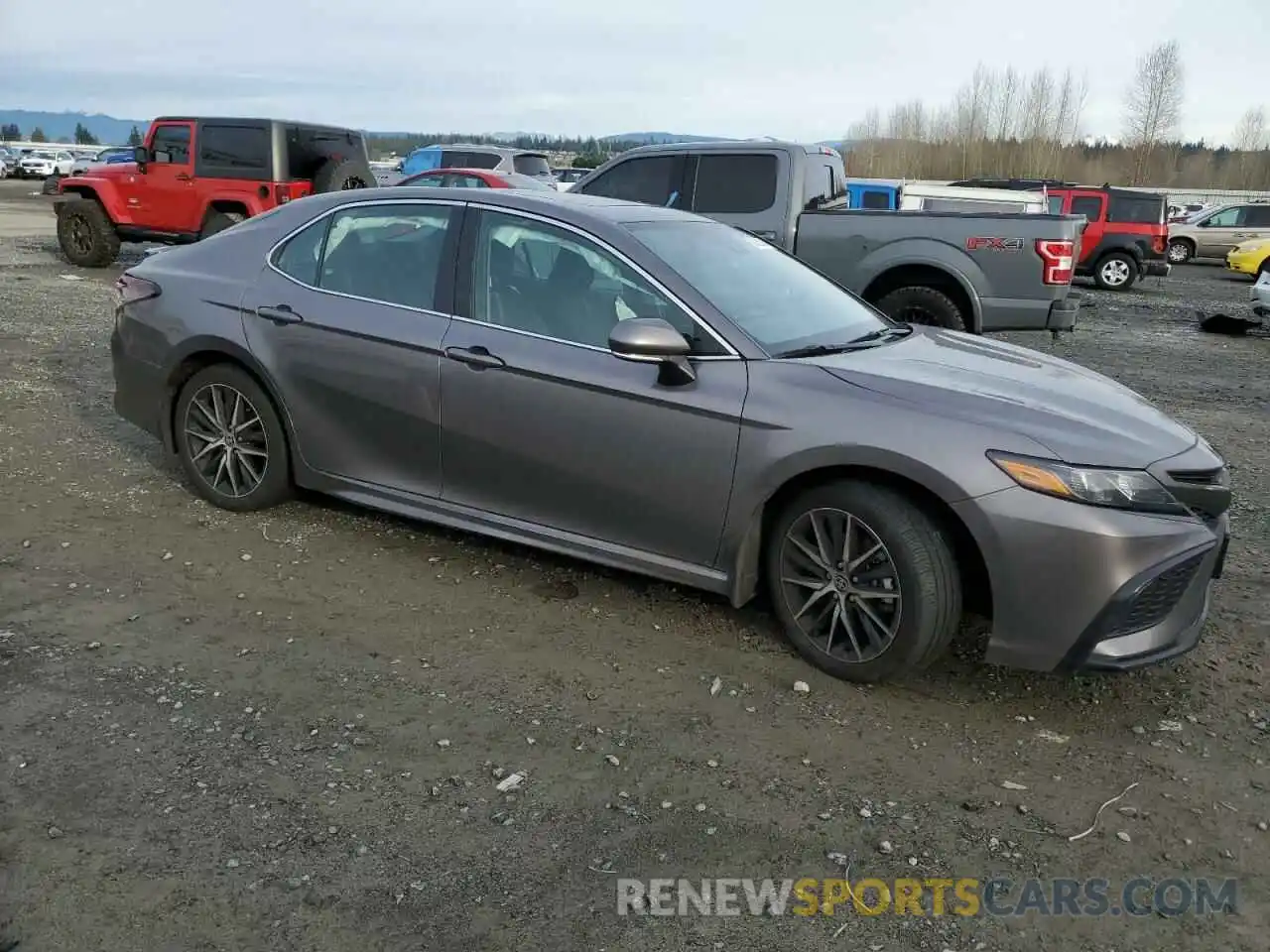 4 Photograph of a damaged car 4T1G11BK8PU104931 TOYOTA CAMRY 2023