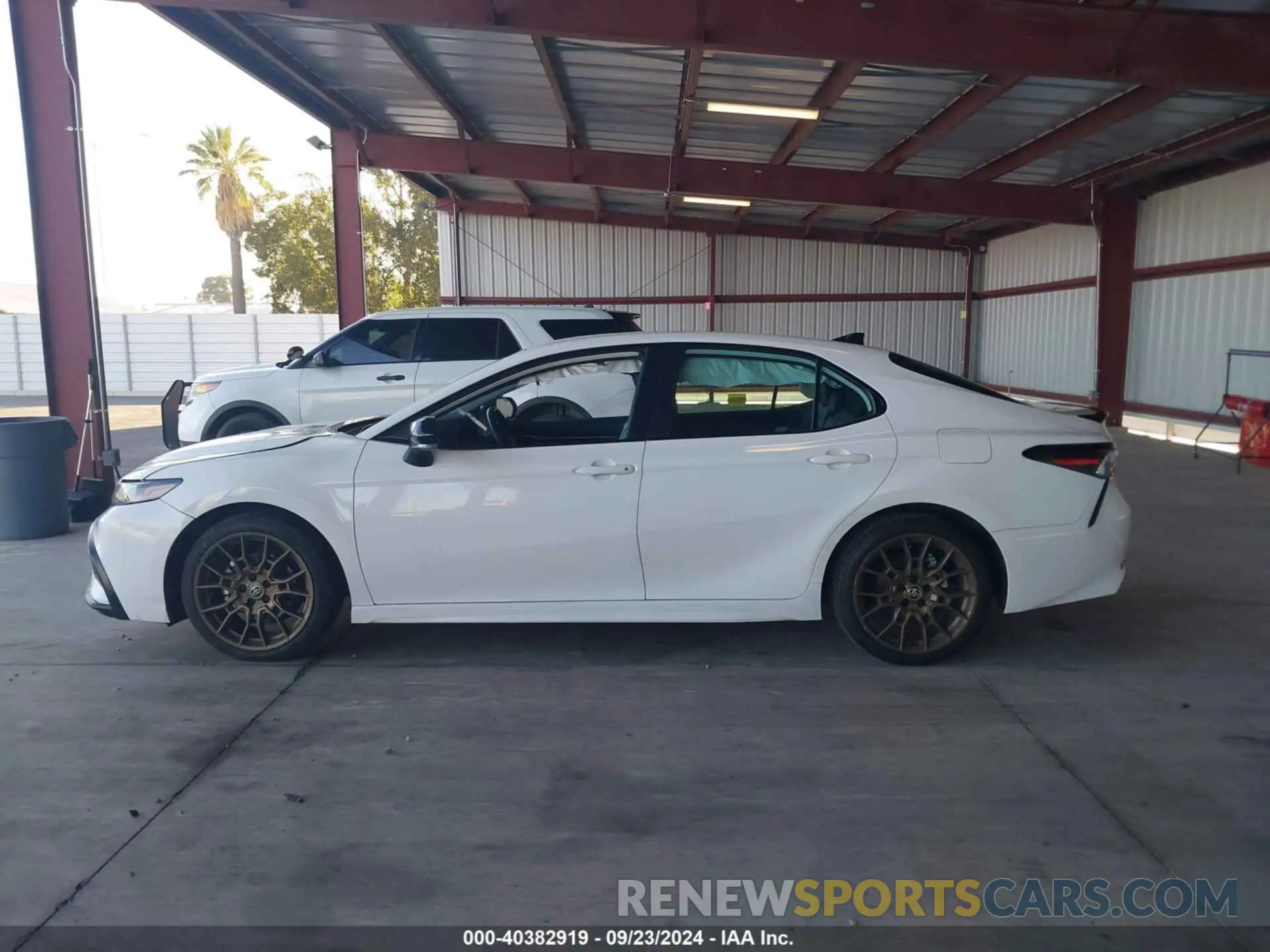 14 Photograph of a damaged car 4T1G31AK3PU056802 TOYOTA CAMRY 2023