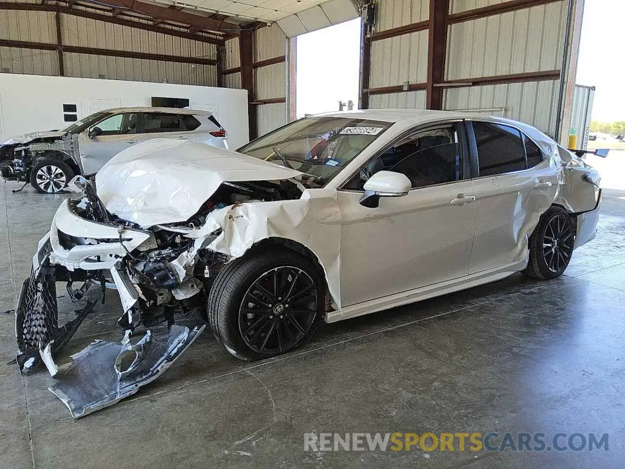 1 Photograph of a damaged car 4T1G31AK8PU615941 TOYOTA CAMRY 2023