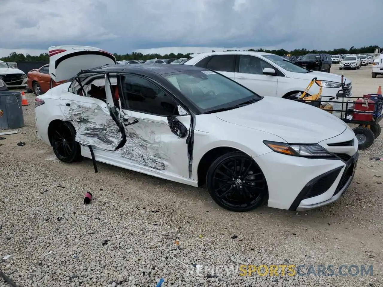 4 Photograph of a damaged car 4T1K31AK2PU048278 TOYOTA CAMRY 2023