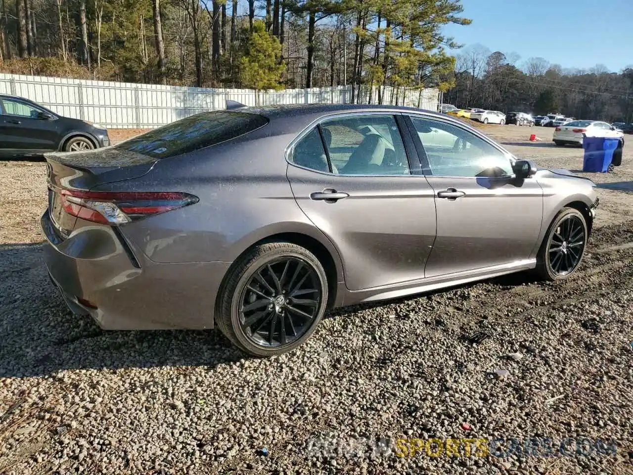 3 Photograph of a damaged car 4T1K31AK3PU610138 TOYOTA CAMRY 2023