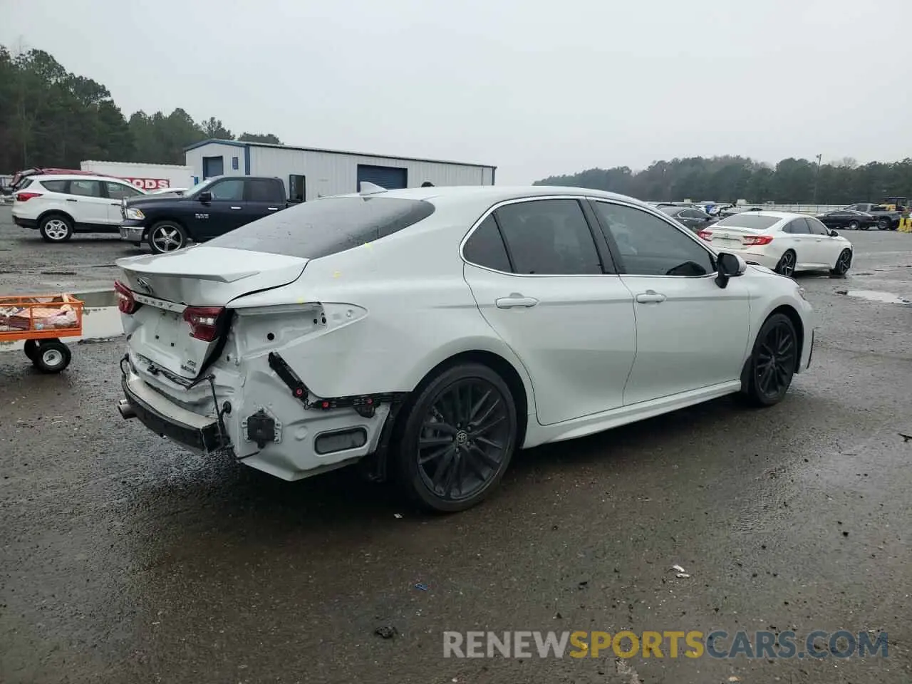 3 Photograph of a damaged car 4T1K31AK4PU047195 TOYOTA CAMRY 2023