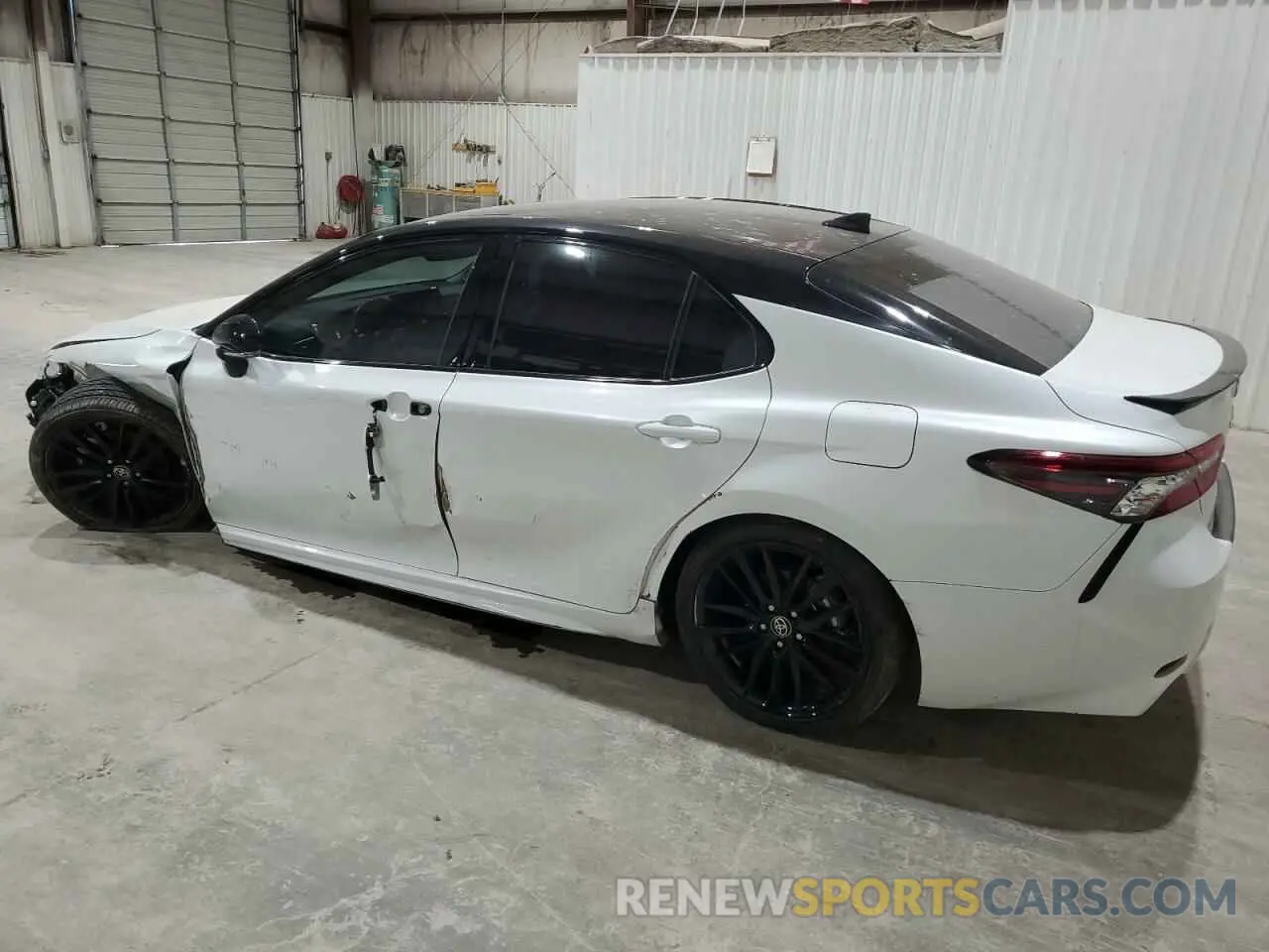2 Photograph of a damaged car 4T1K31AK4PU055409 TOYOTA CAMRY 2023