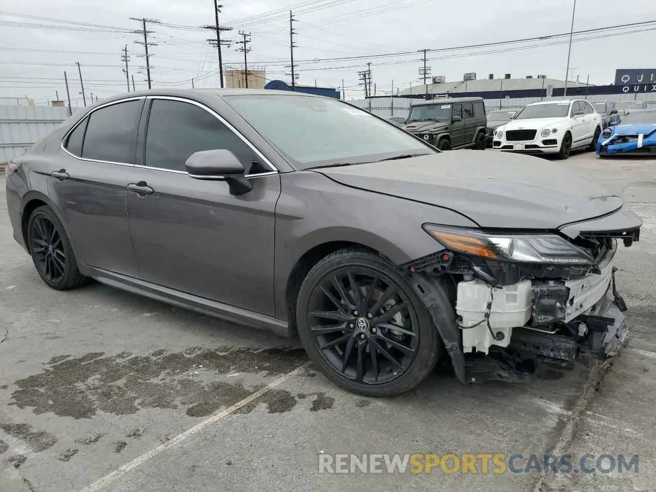 4 Photograph of a damaged car 4T1K31AK6PU617004 TOYOTA CAMRY 2023
