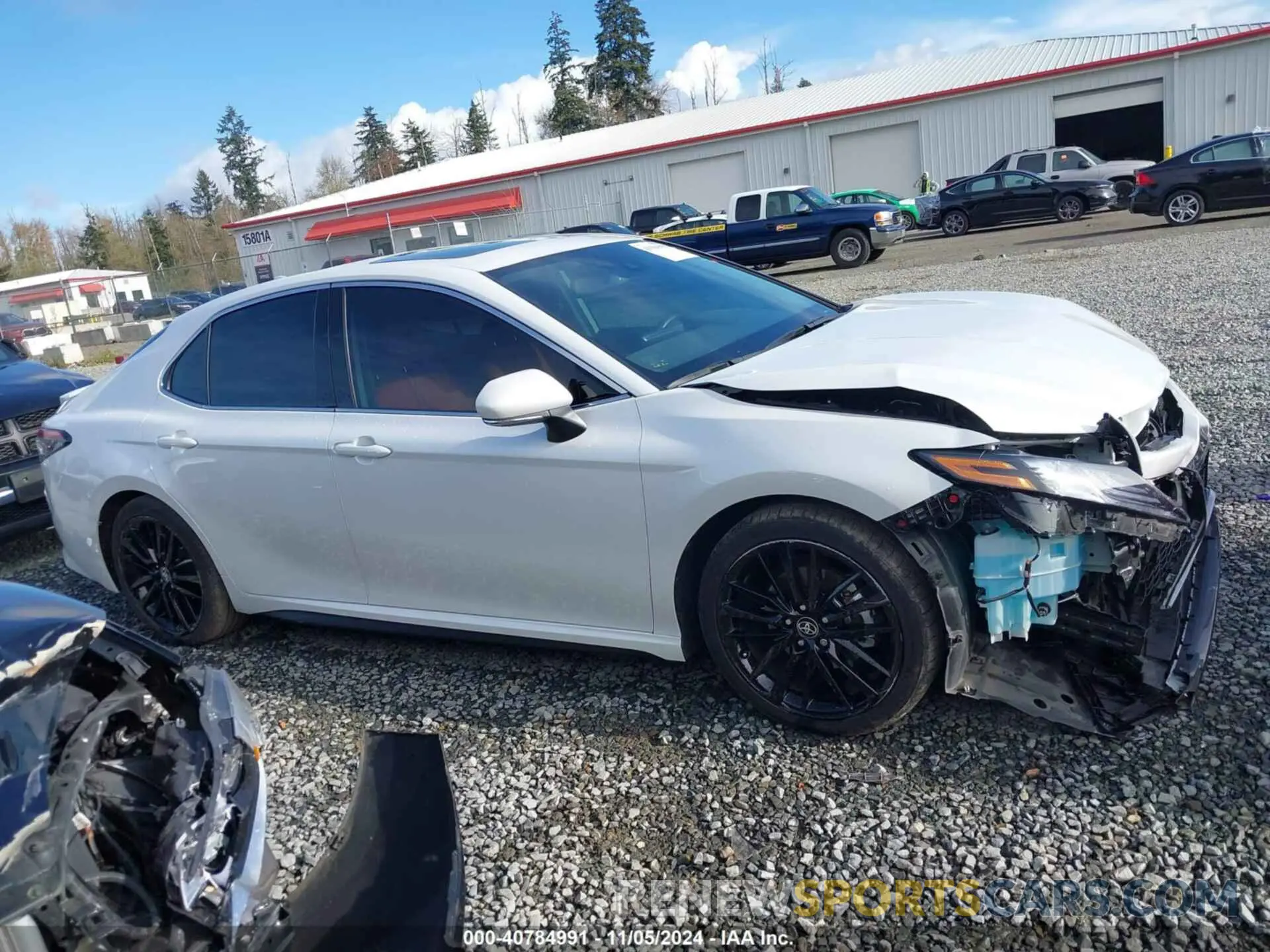 13 Photograph of a damaged car 4T1K31AKXPU616583 TOYOTA CAMRY 2023