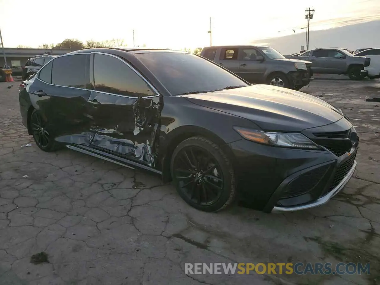 4 Photograph of a damaged car 4T1K61AK0PU809865 TOYOTA CAMRY 2023