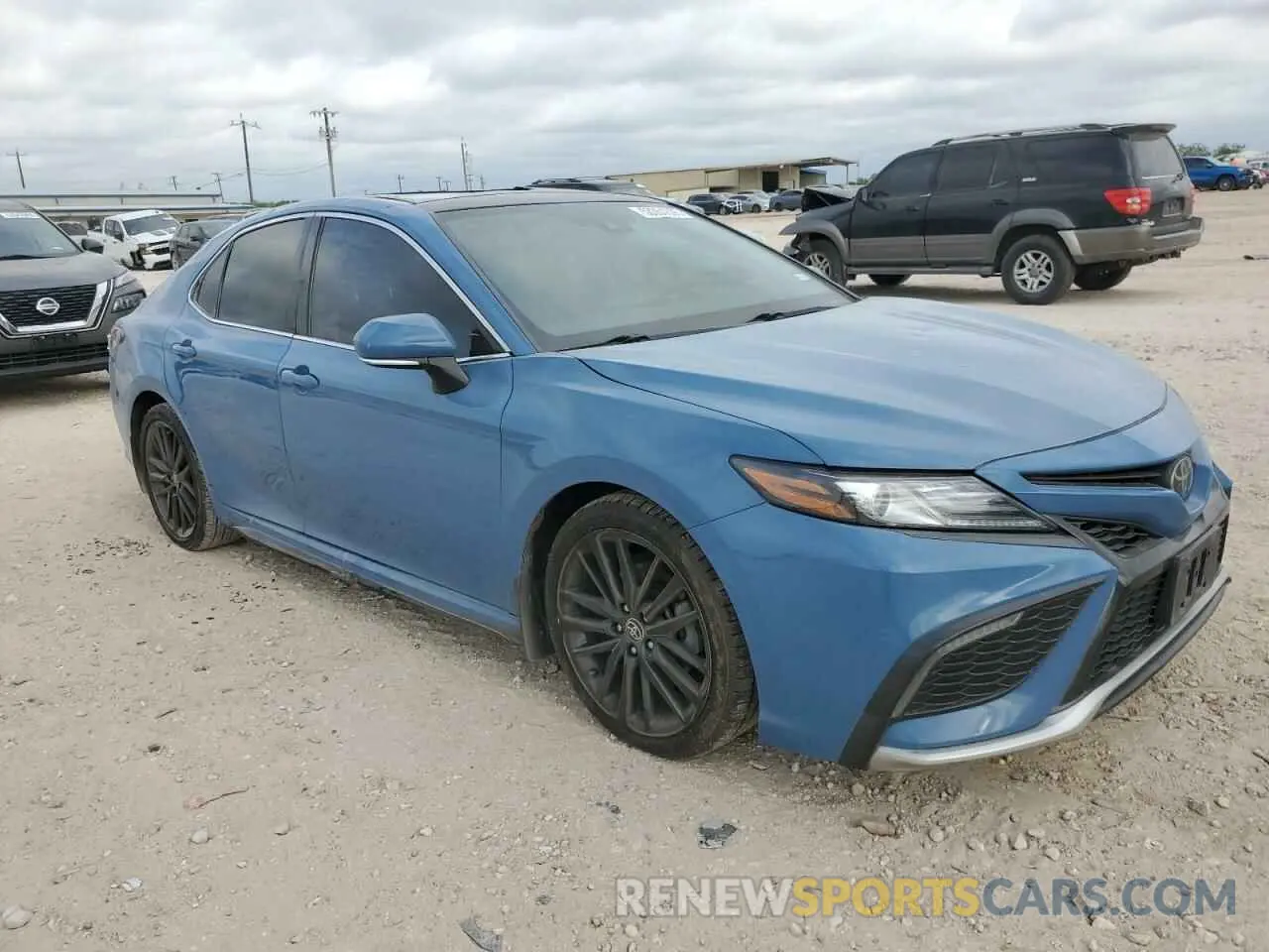 4 Photograph of a damaged car 4T1K61AK1PU143874 TOYOTA CAMRY 2023