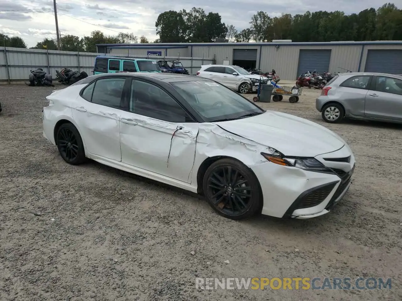 4 Photograph of a damaged car 4T1K61AK4PU148048 TOYOTA CAMRY 2023