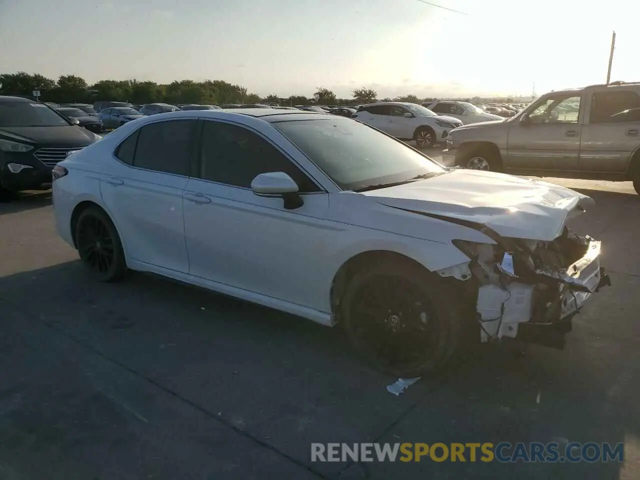 4 Photograph of a damaged car 4T1K61AK4PU172303 TOYOTA CAMRY 2023