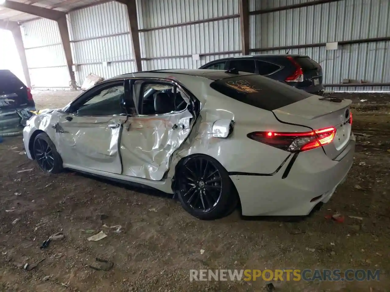 2 Photograph of a damaged car 4T1K61AK7PU092414 TOYOTA CAMRY 2023