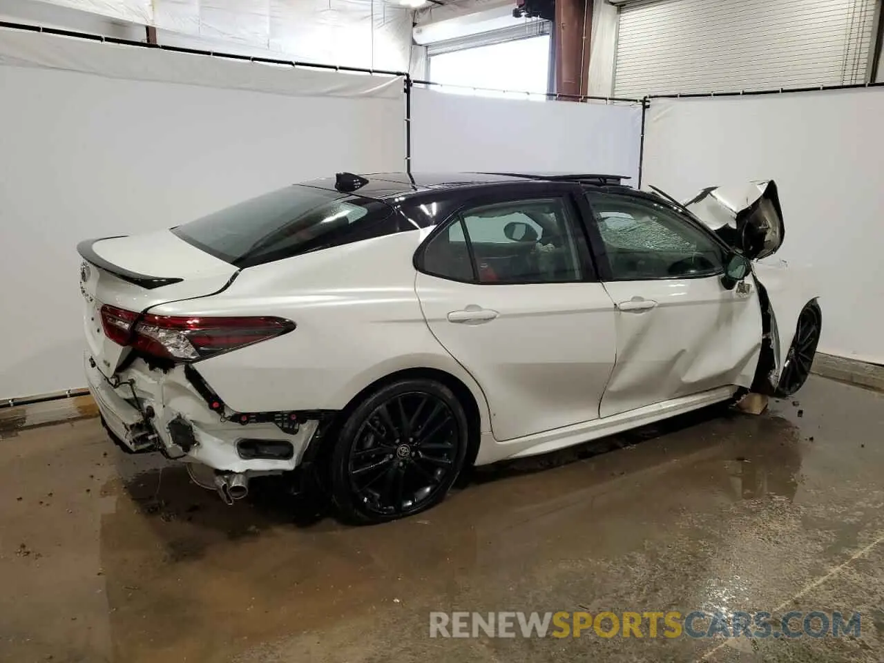 3 Photograph of a damaged car 4T1K61AK7PU132068 TOYOTA CAMRY 2023