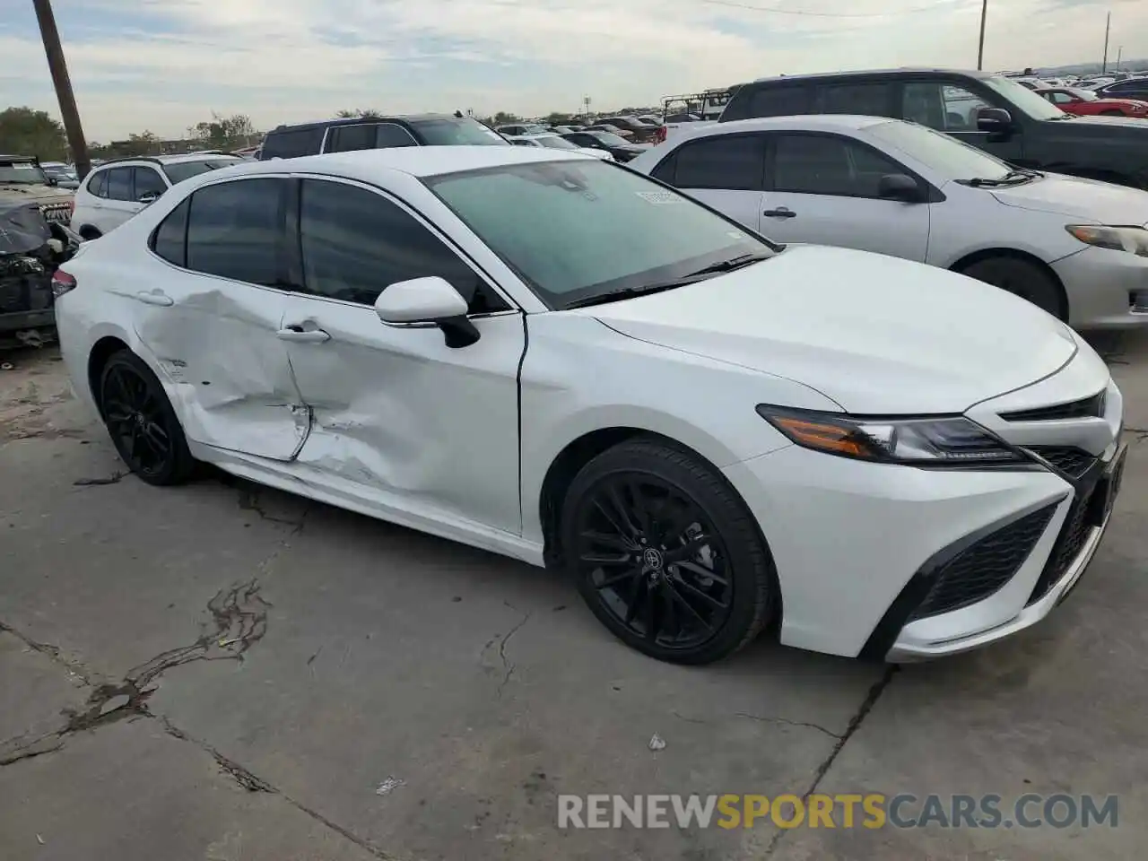 4 Photograph of a damaged car 4T1K61AK8PU084385 TOYOTA CAMRY 2023