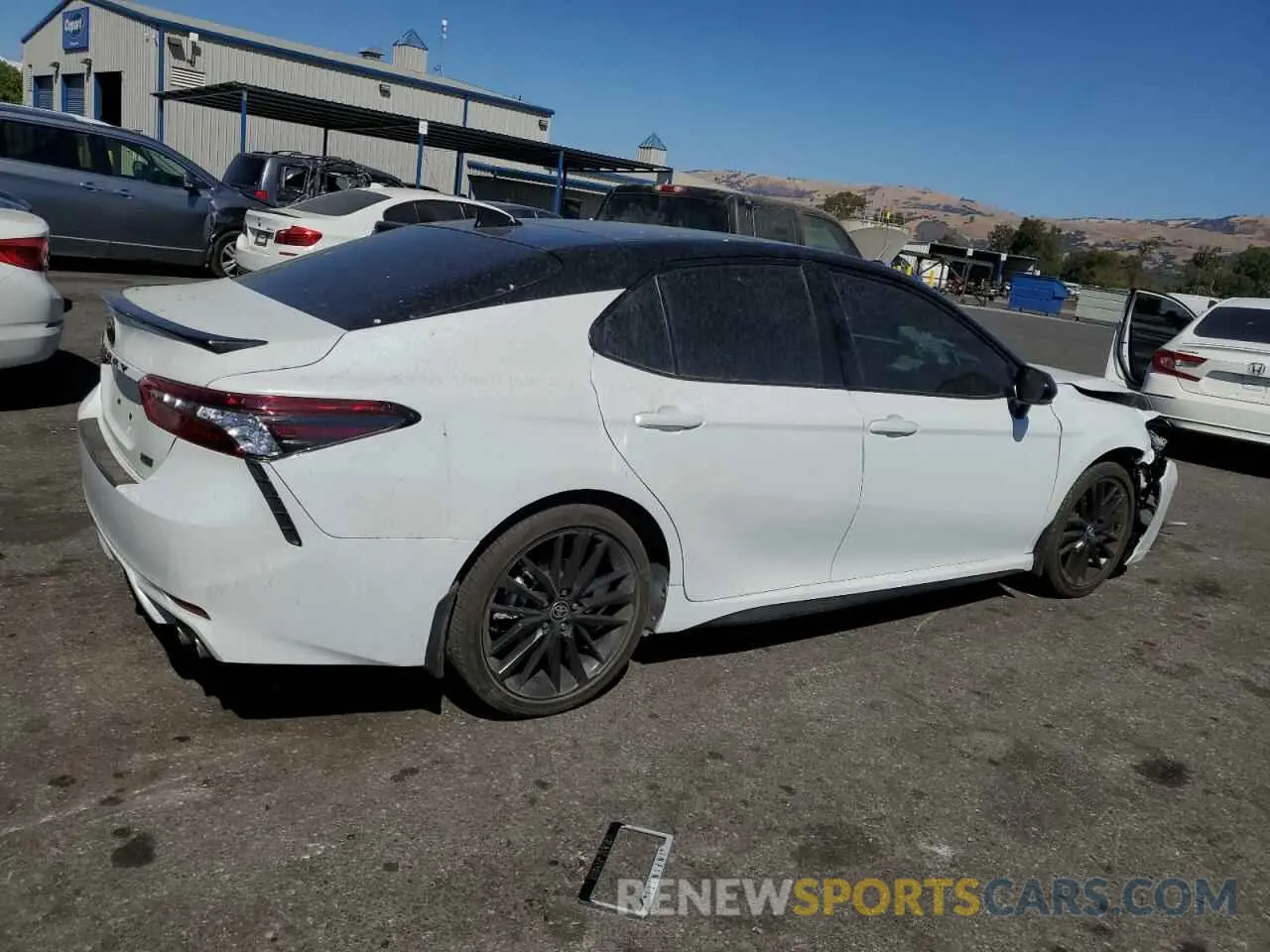 3 Photograph of a damaged car 4T1K61AK9PU164083 TOYOTA CAMRY 2023