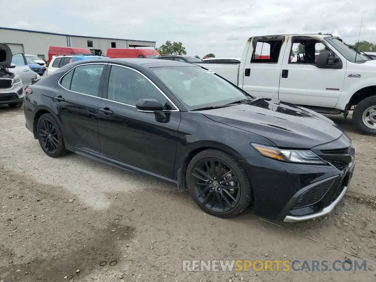 4 Photograph of a damaged car 4T1K61BK4PU100581 TOYOTA CAMRY 2023