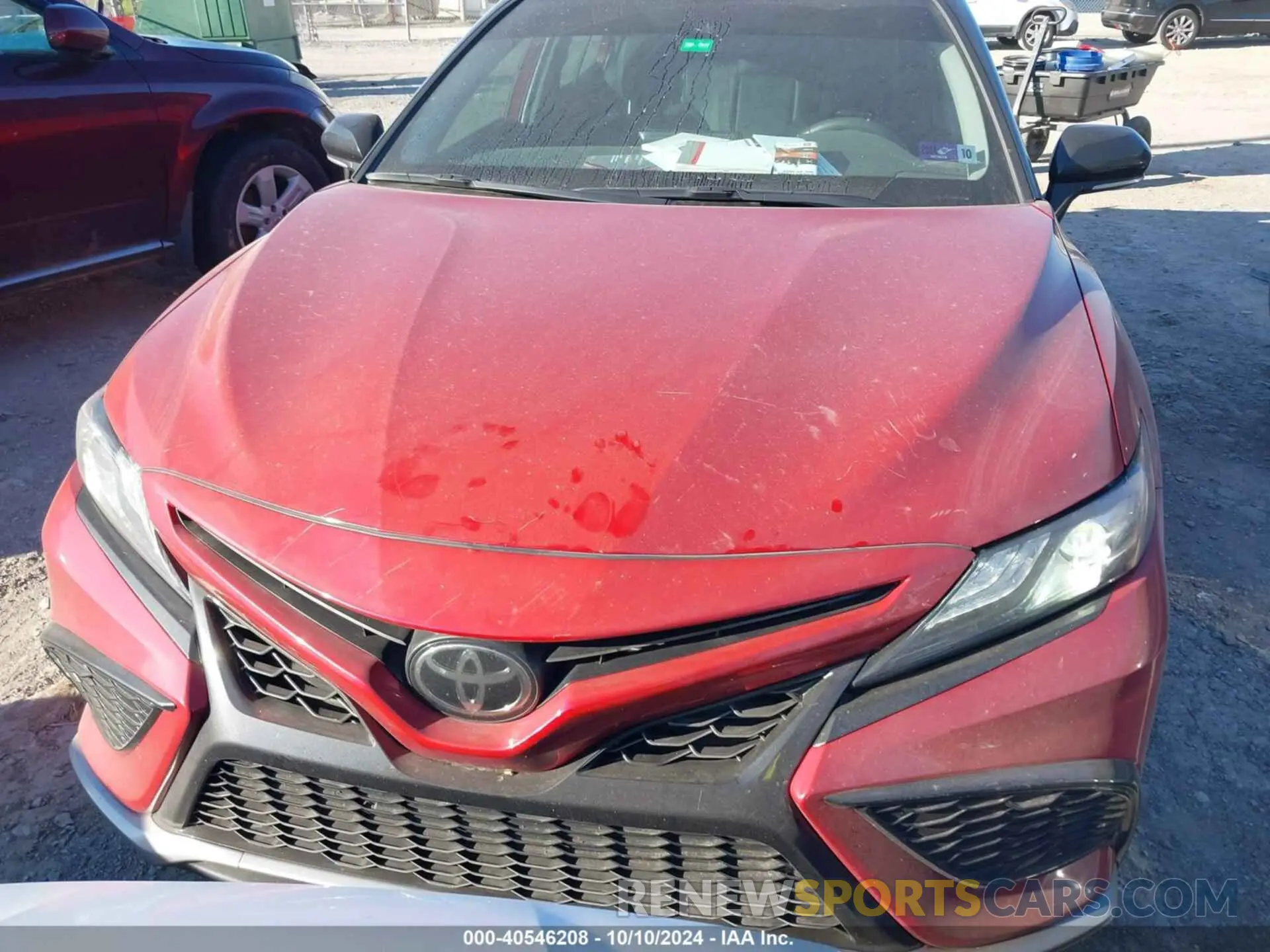 12 Photograph of a damaged car 4T1K61BKXPU074066 TOYOTA CAMRY 2023