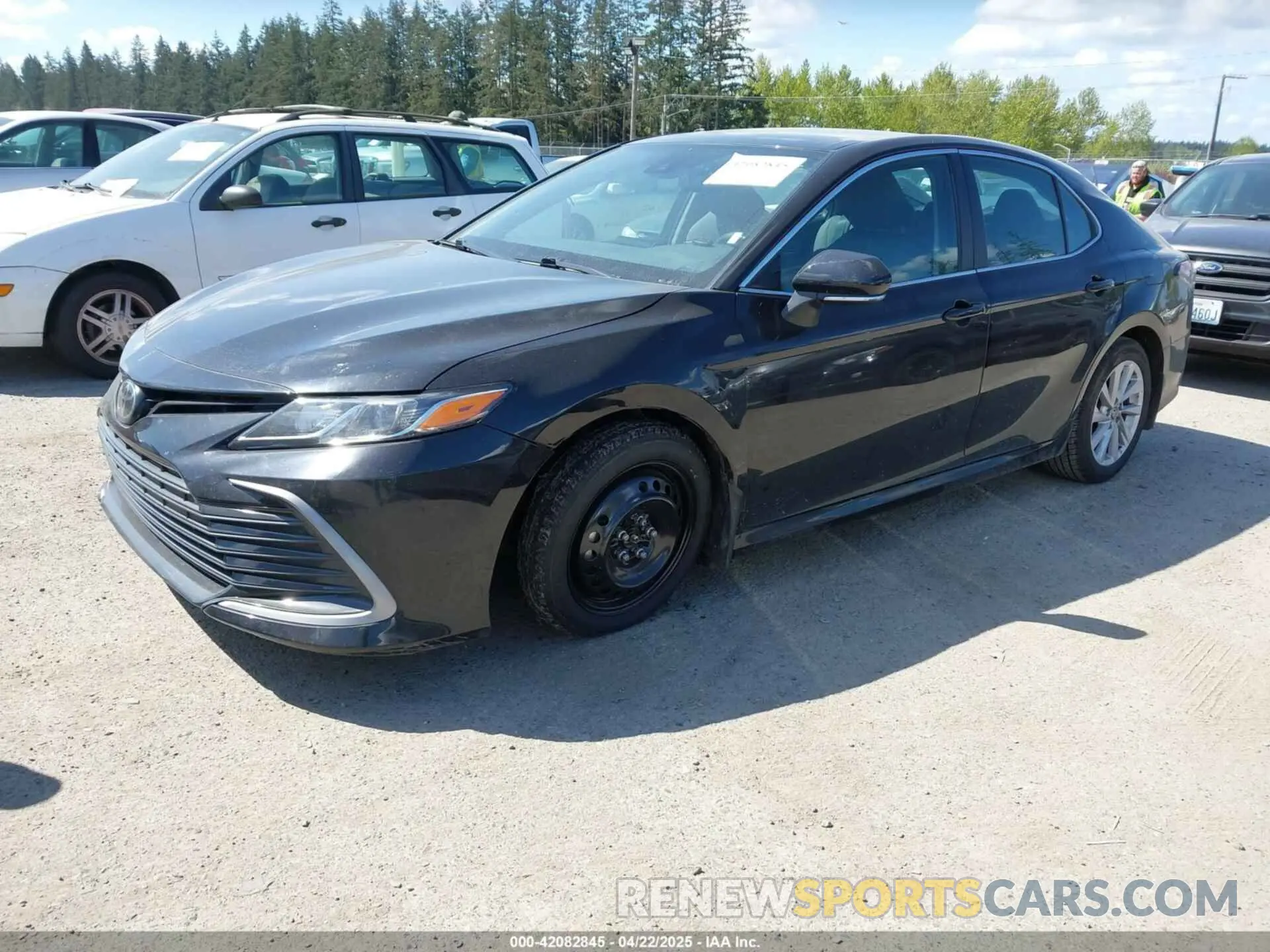 2 Photograph of a damaged car 4T1R11AK0PU759854 TOYOTA CAMRY 2023