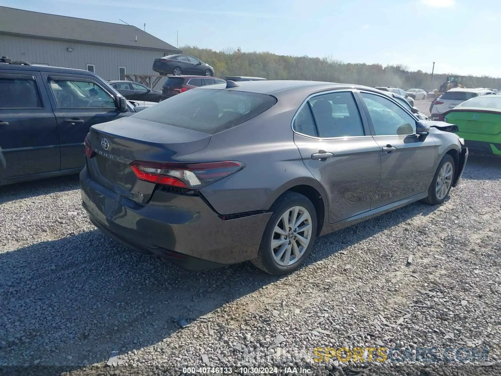4 Photograph of a damaged car 4T1R11AK0PU795124 TOYOTA CAMRY 2023