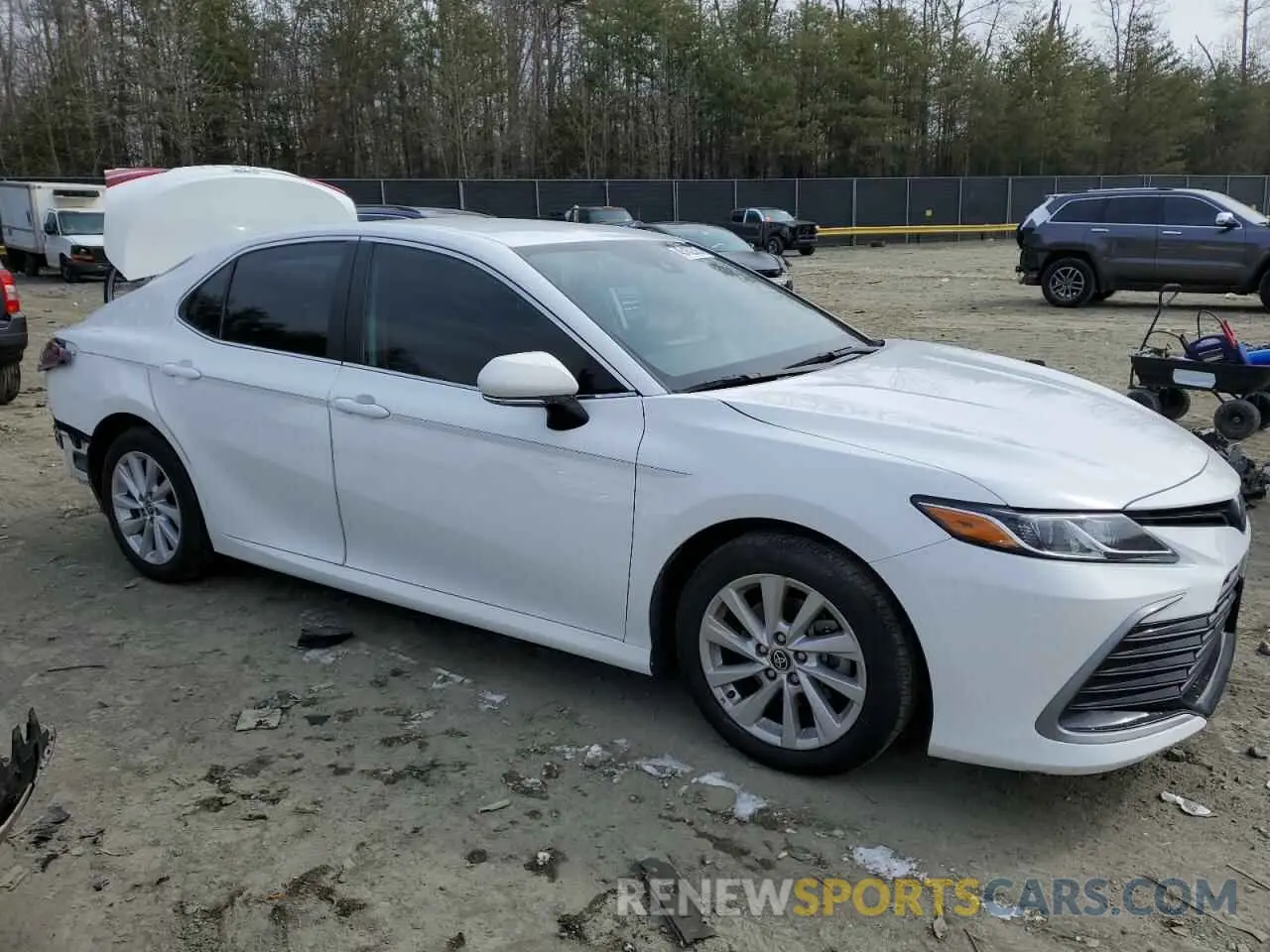4 Photograph of a damaged car 4T1R11AK0PU819423 TOYOTA CAMRY 2023
