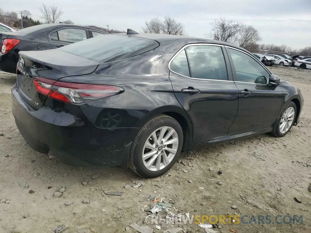3 Photograph of a damaged car 4T1R11AK3PU789611 TOYOTA CAMRY 2023
